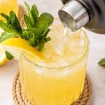 Pouring a bourbon smash