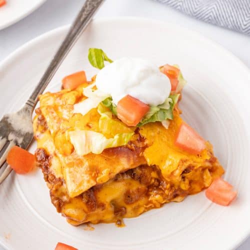 Slice of taco bake on a plate.