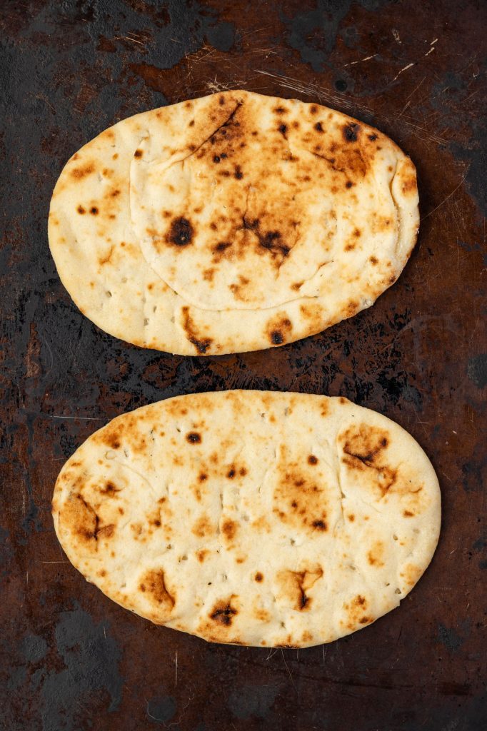 naan on a sheet pan.