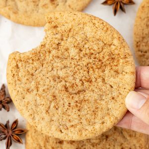 Pumpkin Pie Spice Cookies being held by a hand