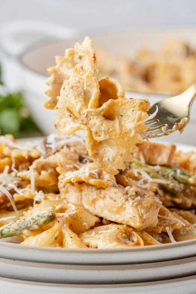 Jerk Chicken Pasta on a fork up close