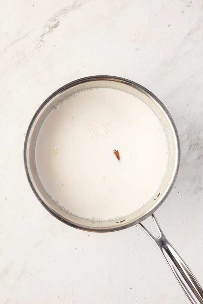 Spices and milk in a pot