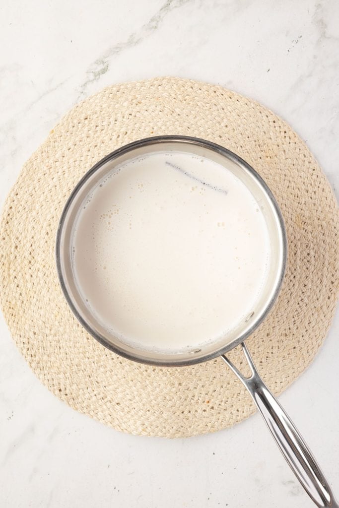 Simmering milk in a pot