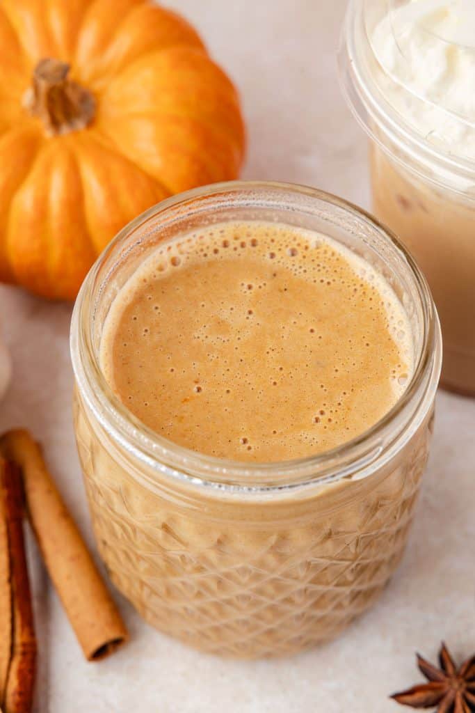 Pumpkin sauce in a mason jar with the lid off