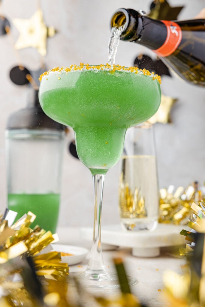 Two glasses of champagne margarita with a fun New Year's