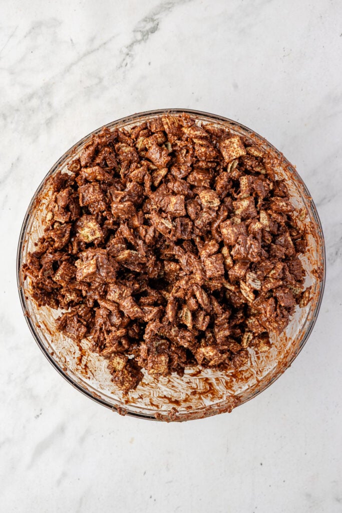 Chocolate covered chexs in a mixing bowl