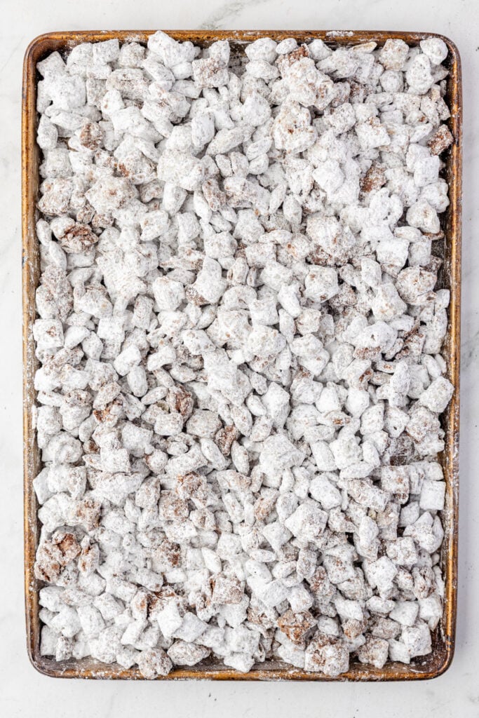 Dubai Chocolate Puppy Chow on a sheet pan