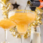 Two glasses of champagne margarita with a fun New Year's