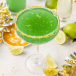 Two glasses of champagne margarita with a fun New Year's