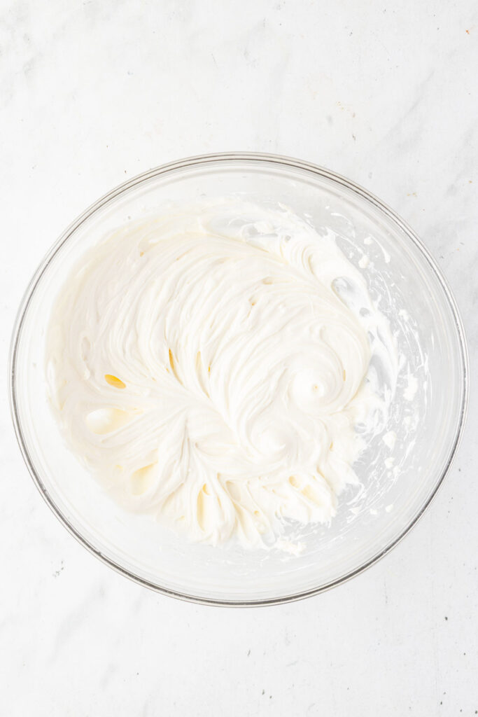 Cream cheese filling, beaten up in a mixing bowl