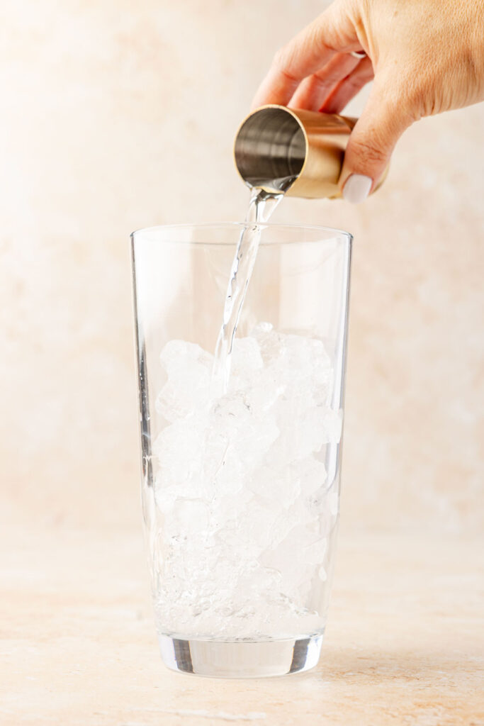 Pouring tequila into cocktail shaker