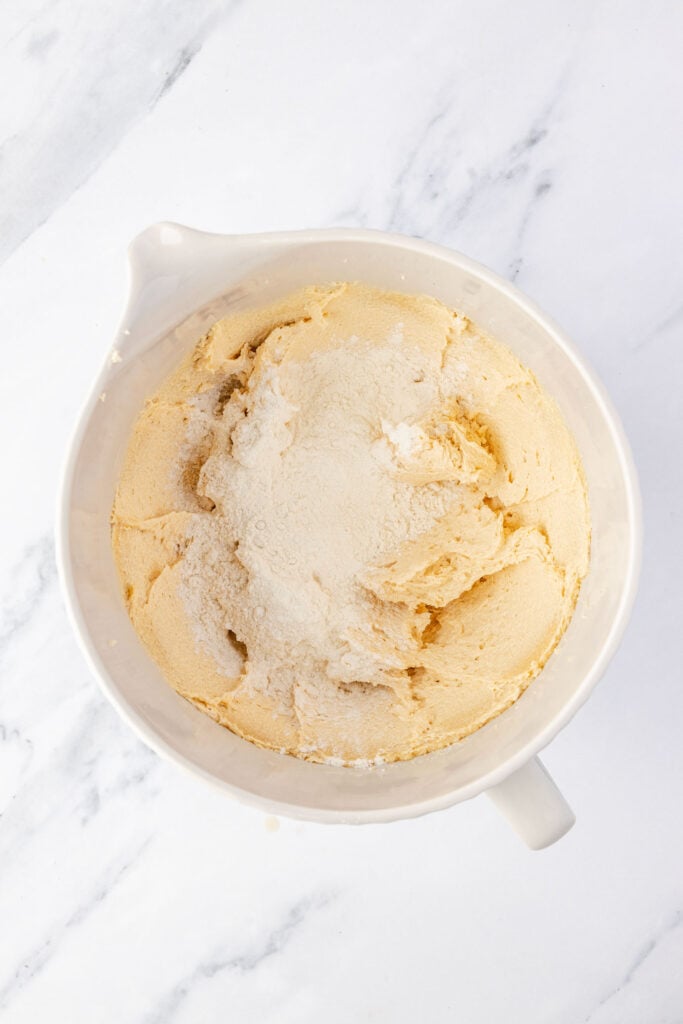 Butter mixture with the flour mixture and a mixing bowl.