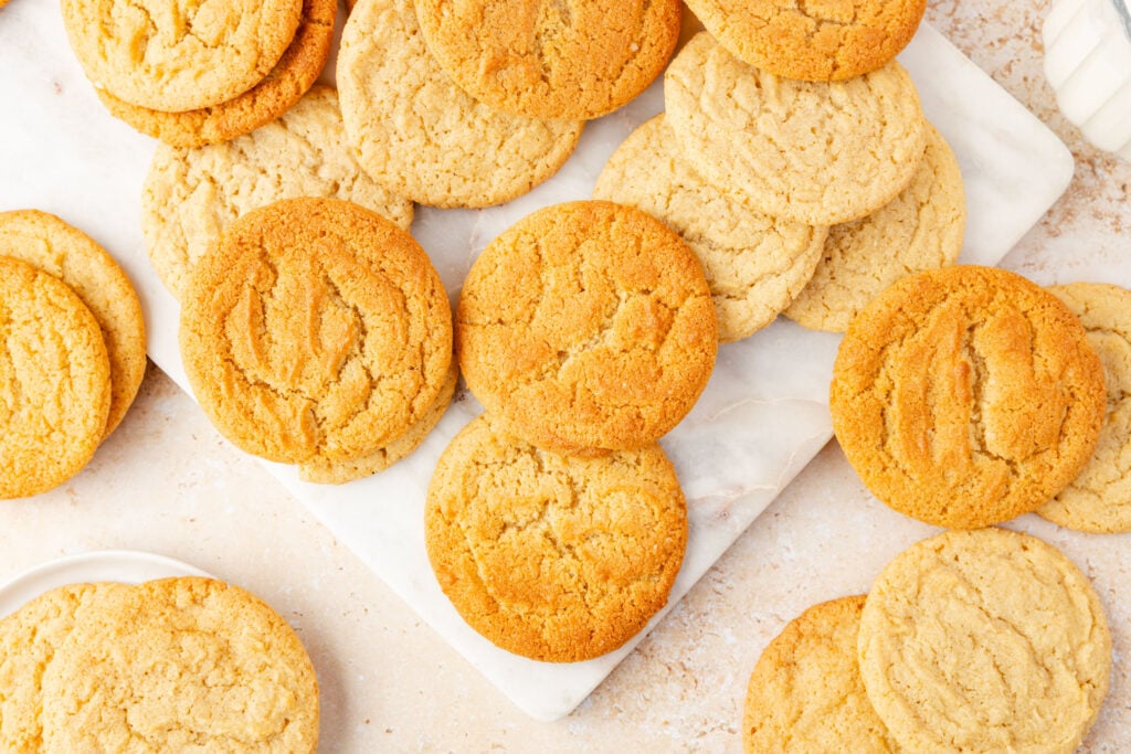 Chocolate chip cookies on a marble tray.