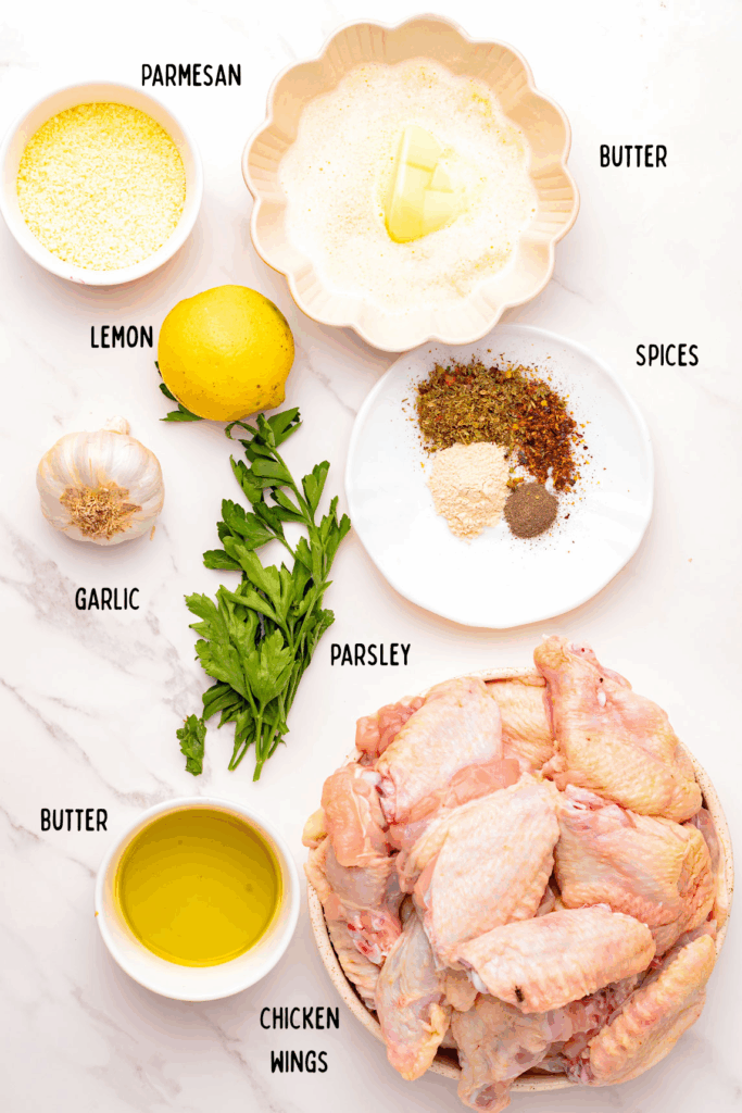 ingredients in small bowls for Air Fryer Garlic Parmesan Wings