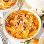 Beef Cabbage Soup in a bowl with a spoon