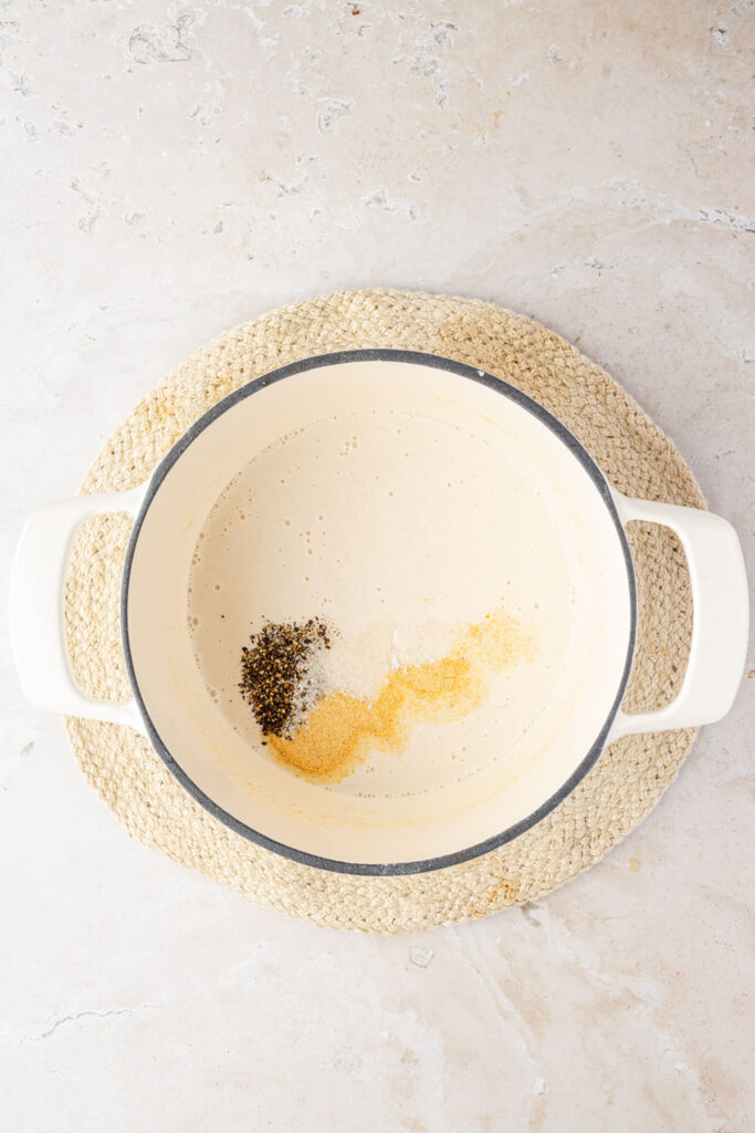 Milk and spices in a pot