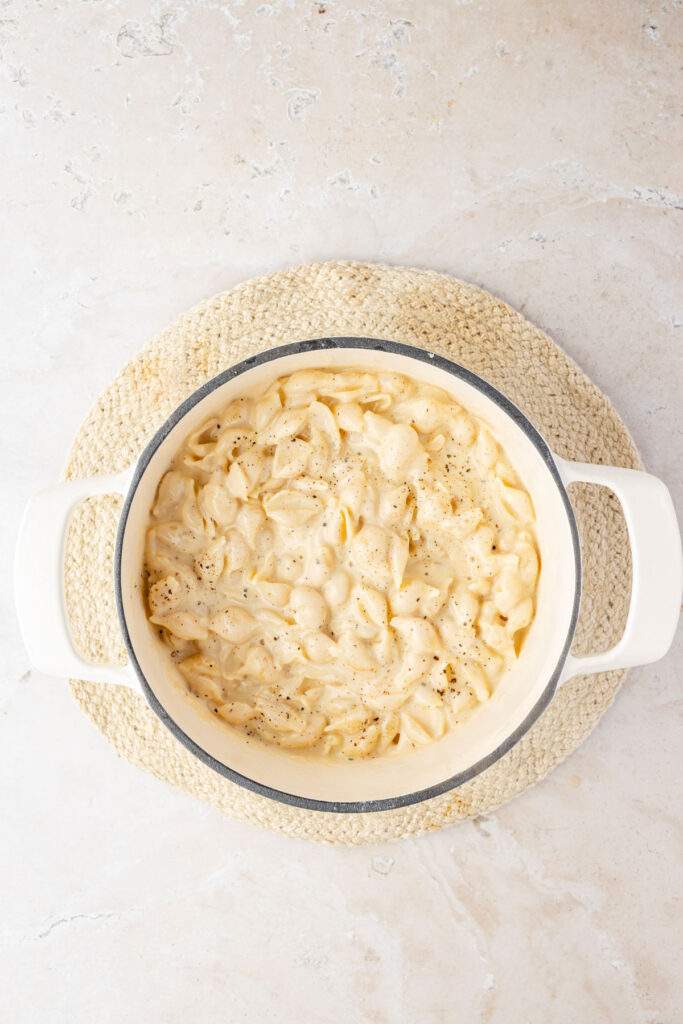Dutch oven filled with finished Smoked Gouda Mac and Cheese