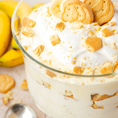 Trefoil Banana Pudding in a trifle bowl topped with Girl Scout cookies