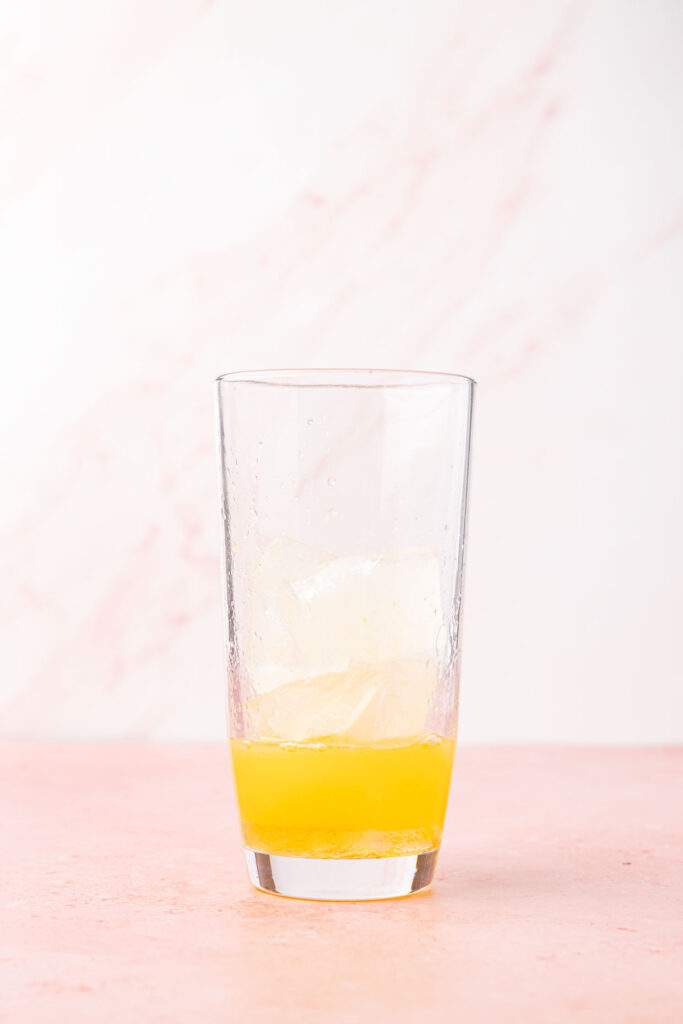 Cocktail shaker full of ice and margarita mix