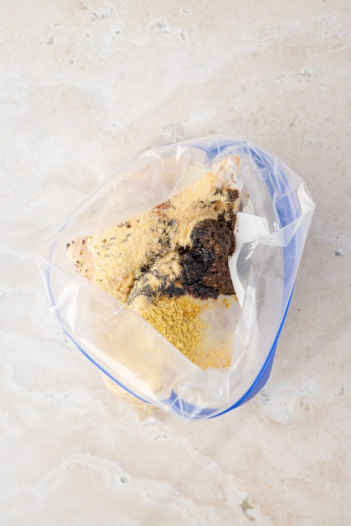 Ziploc bag, full of spices, jerk, seasoning, paste, oil, and browning seasoning for jerk chicken