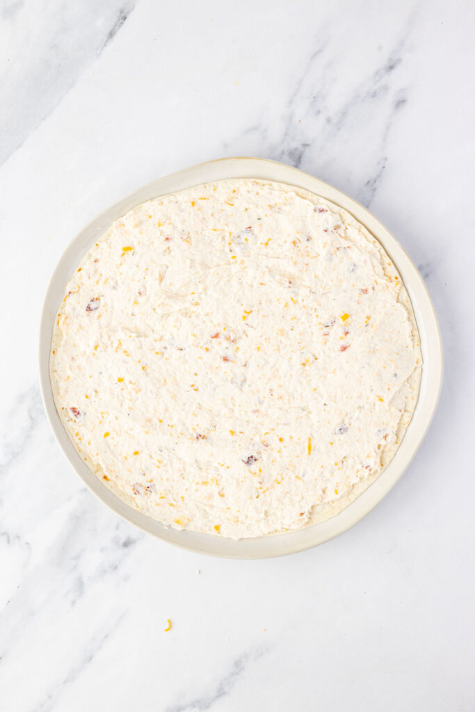 Crack chicken filling on a tortilla