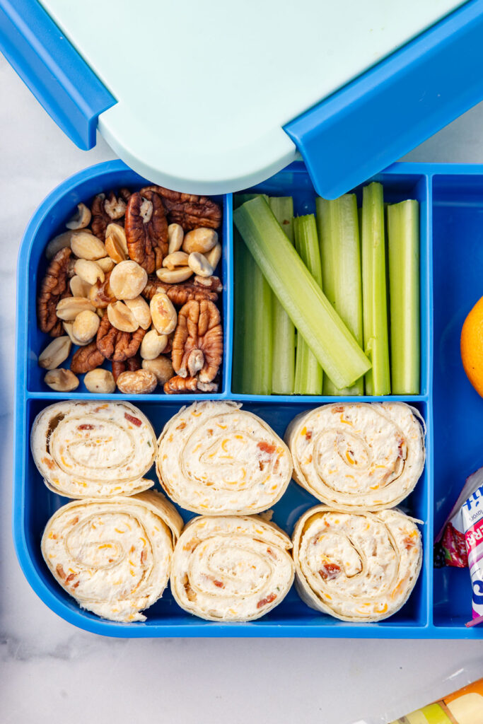 Cracked chicken pinwheels in a lunchbox