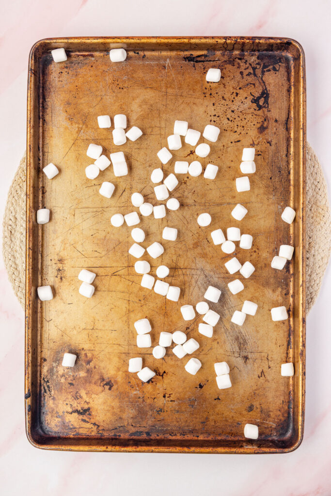 Mini marshmallows on a sheet pan