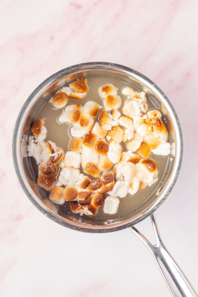 Toasted marshmallows, sugar, water, in a pot