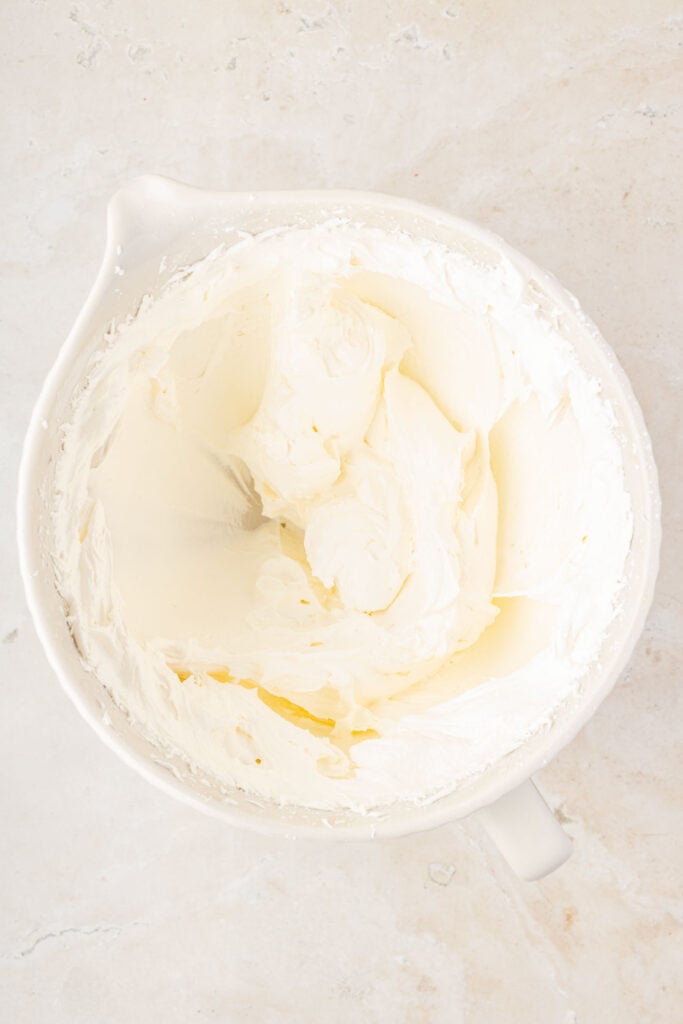 A buttercream frosting in a mixing bowl.