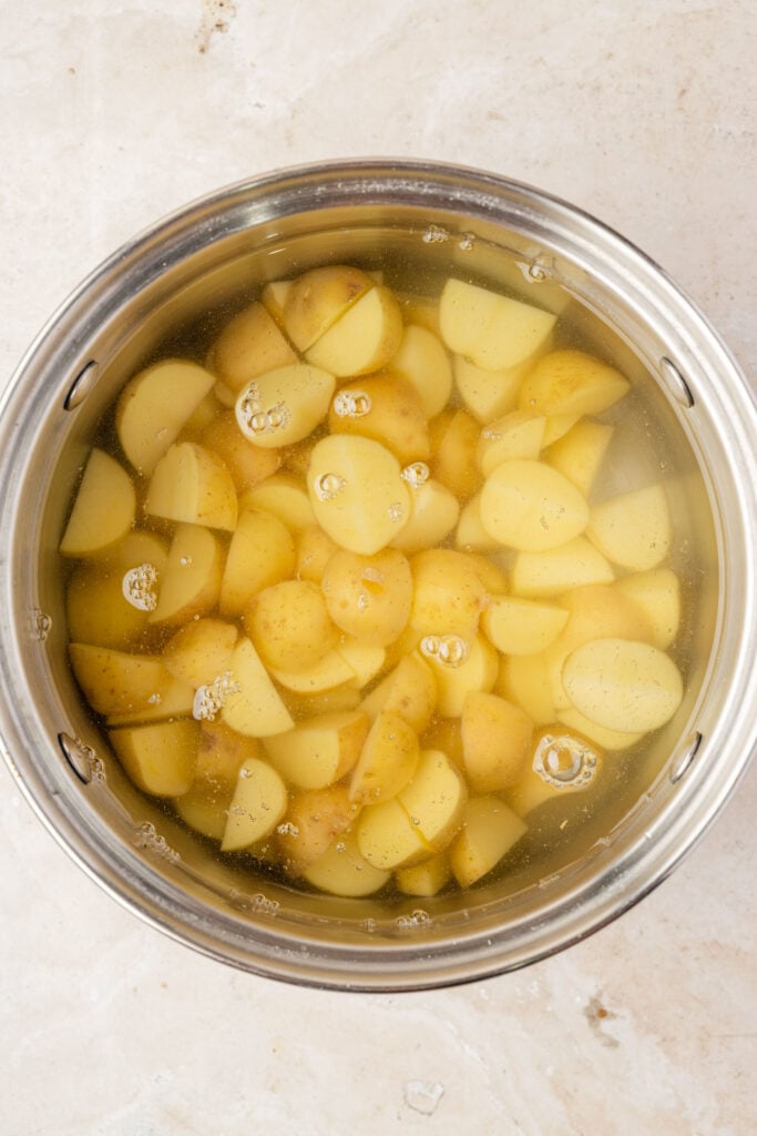 Potatoes being boiled in a pot