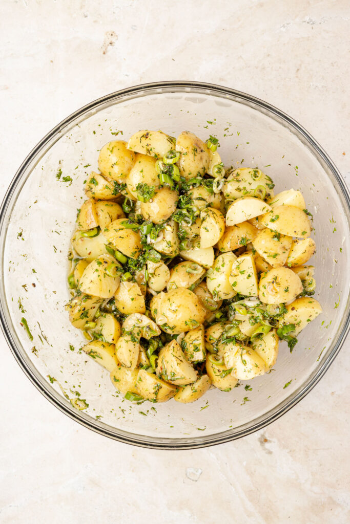 Finished French Potato Salad (Easy No Mayo Potato Salad) in a mixing bowl