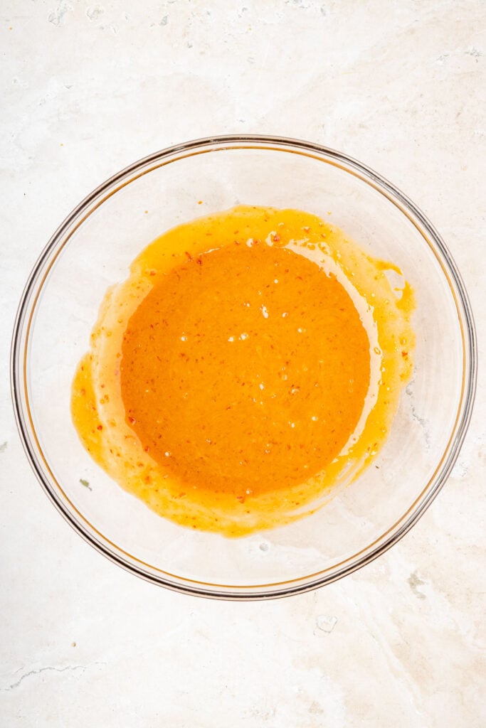 Sesame sauce in a large mixing bowl for sesame noodles.