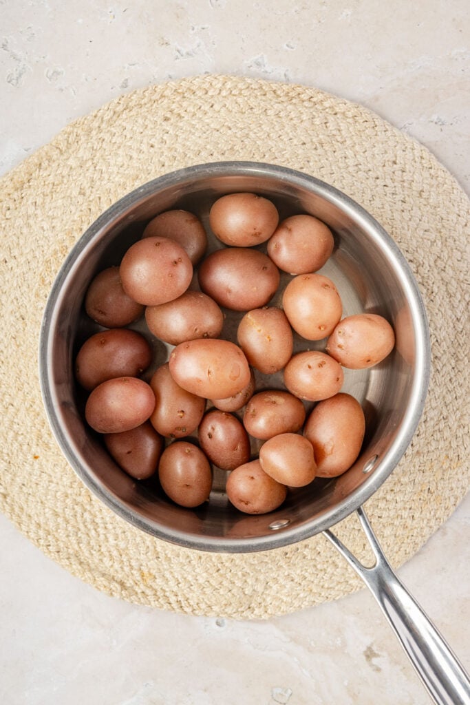 Pot of boiled potatoes.