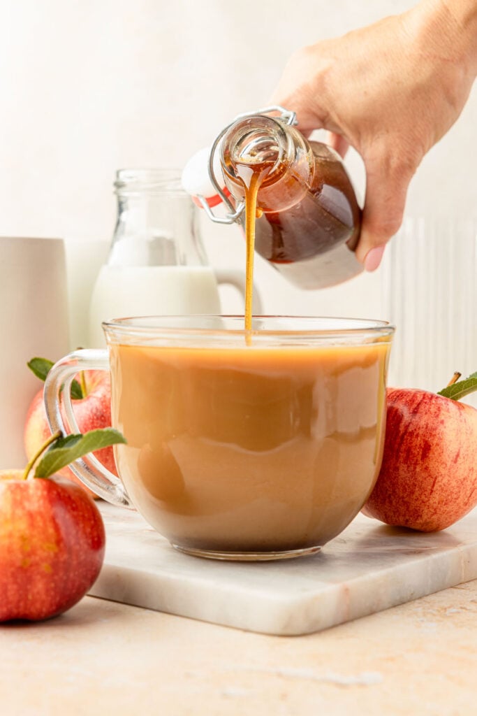 Apple Brown sugar syrup being poured into a coffee