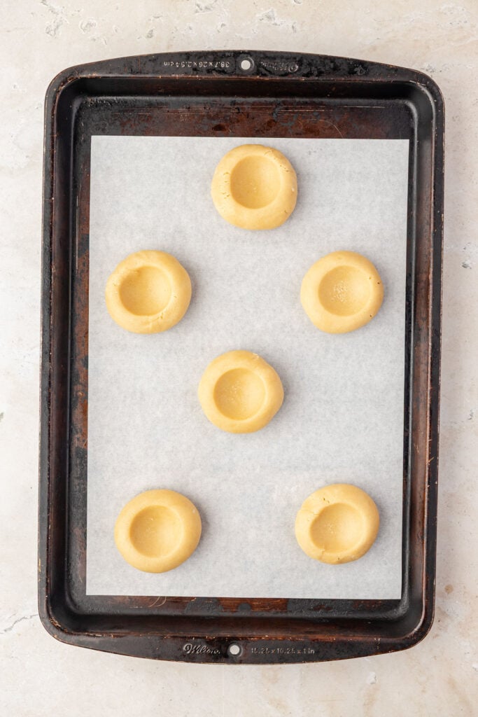 raw Cookies dough on a sheet pan