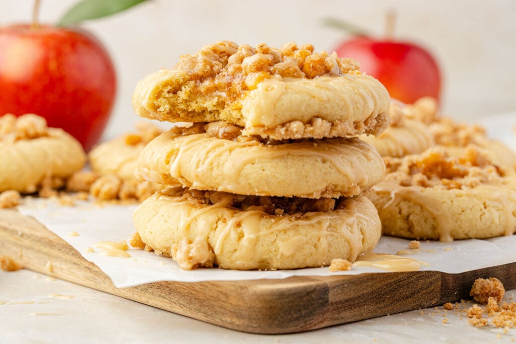 Apple Pie Cookies on a board with apples in the background