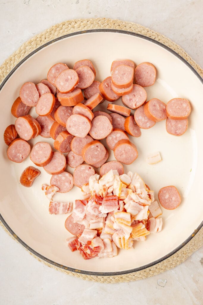 sausage and bacon in a pan