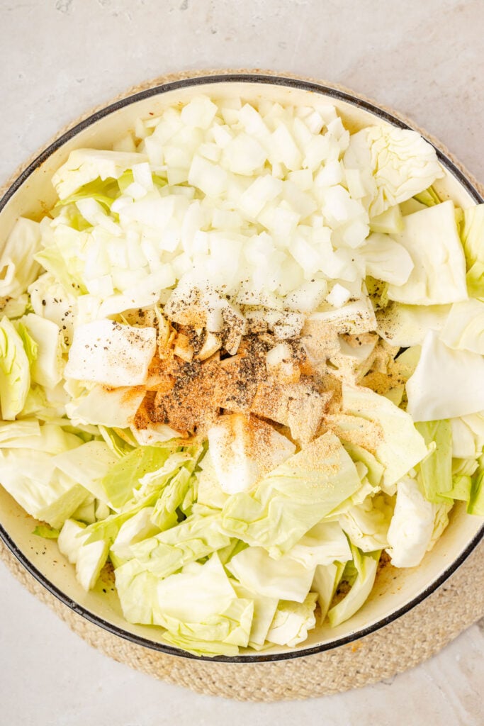 cabbage, onion, spices in a pan