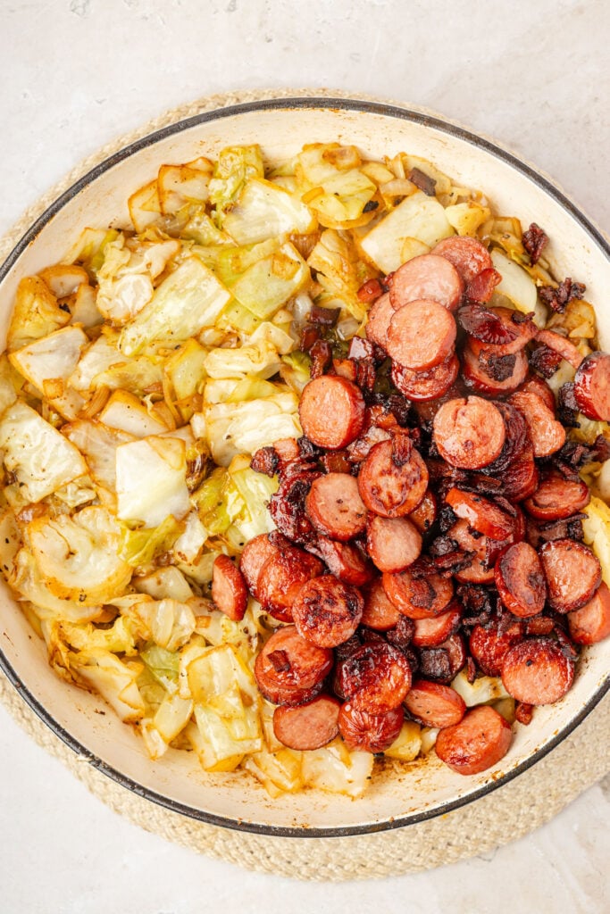 cooked cabbage in a pan with meat