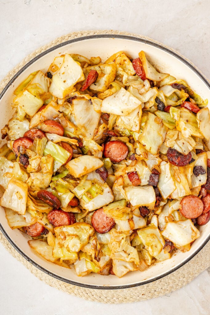 finished Fried Cabbage and Sausage in a pan