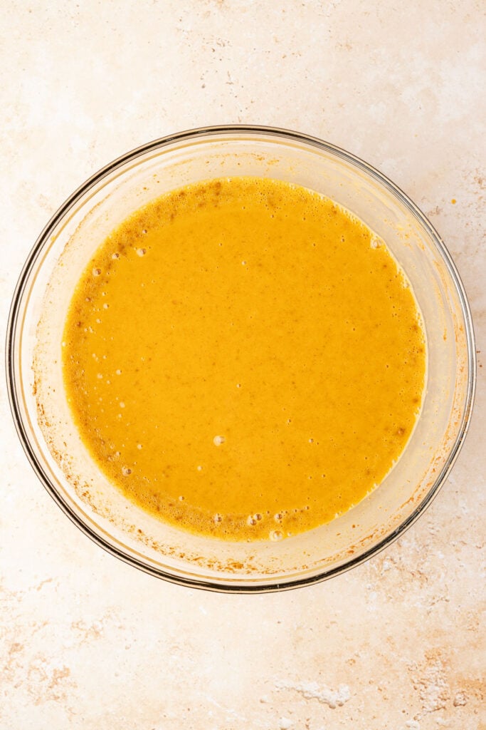Pumpkin filling batter in a mixing bowl