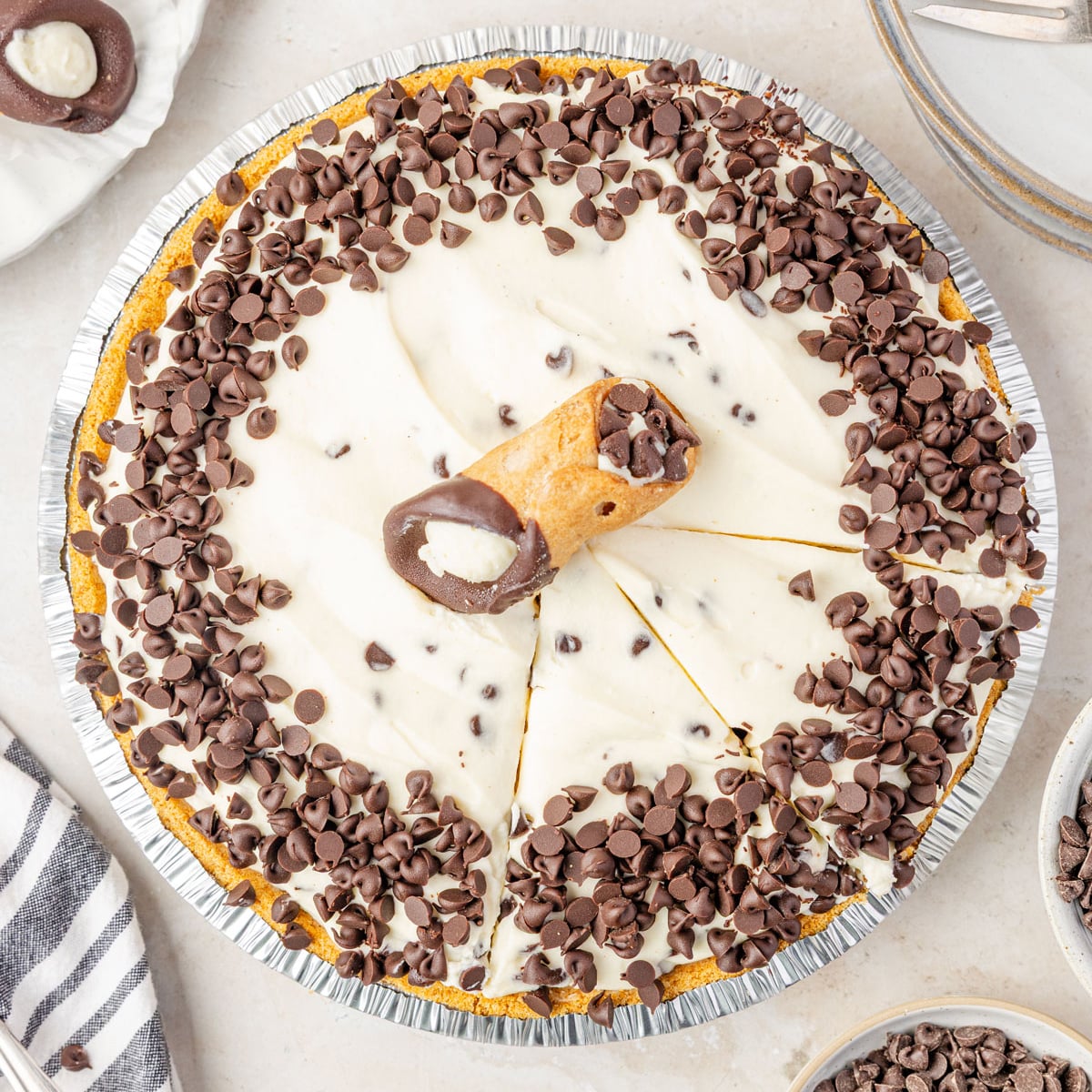 Cannoli Pie with a cannoli on top