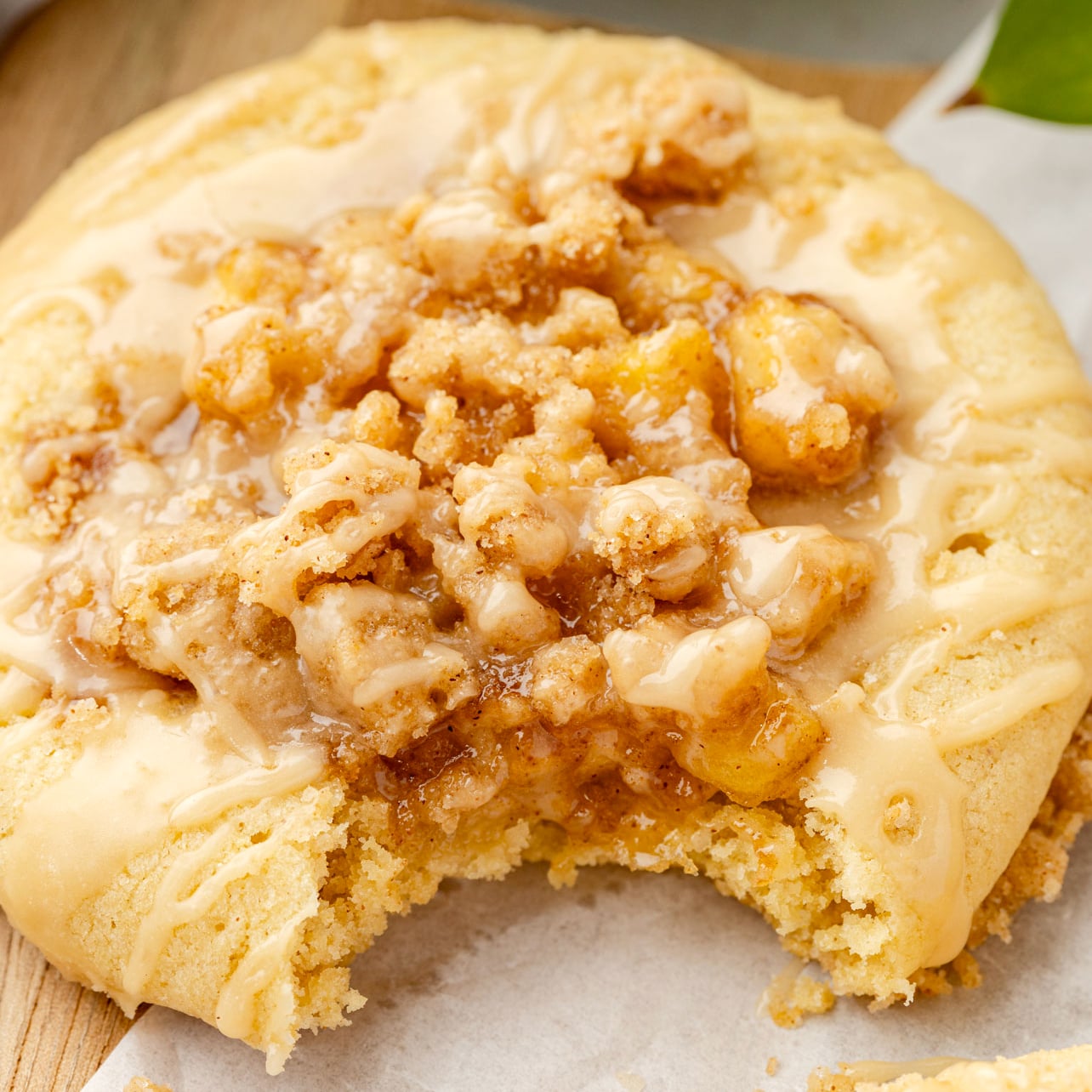 Apple Pie Cookies on a board with a bite taken out of it.
