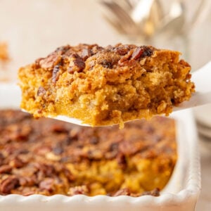 Pumpkin Crunch Cake on a spatula being removed from the cake