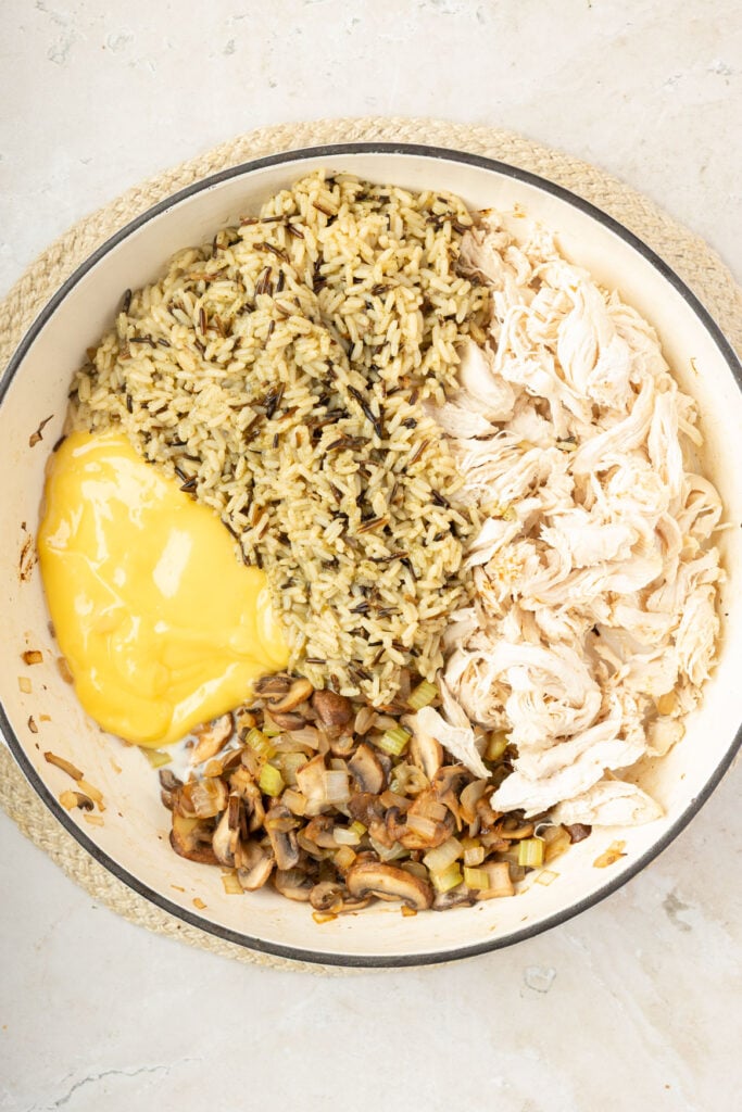 Rice, chicken, cream of mushroom soup, sautéed vegetables, and a skillet