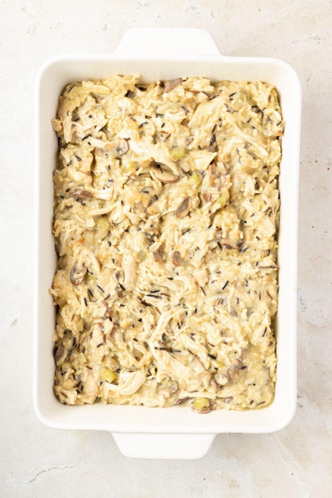 Chicken filling in a casserole pan for Chicken Wild Rice Casserole