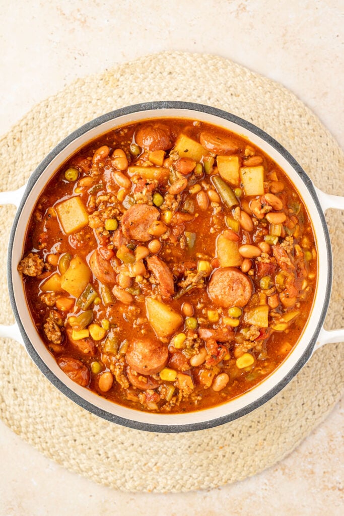 Finish cowboy stew in a Dutch oven.