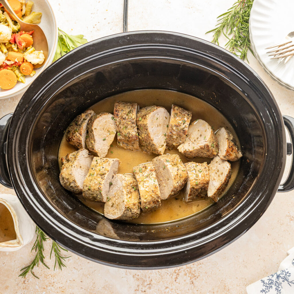 Slow Cooker Pork Tenderloin with Maple Dijon Sauce in a slow cooker