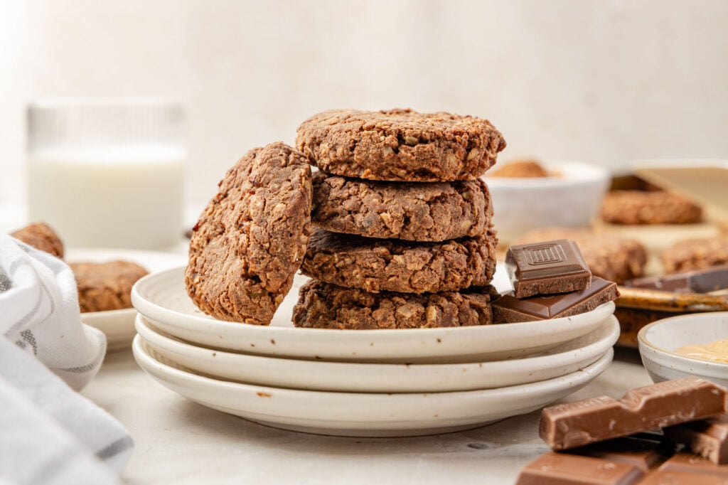Chocolate no bake cookies on a plate stacked up