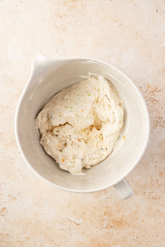 Mixing bowl filled with mixed together, cream cheese mixture for crack, chicken dip